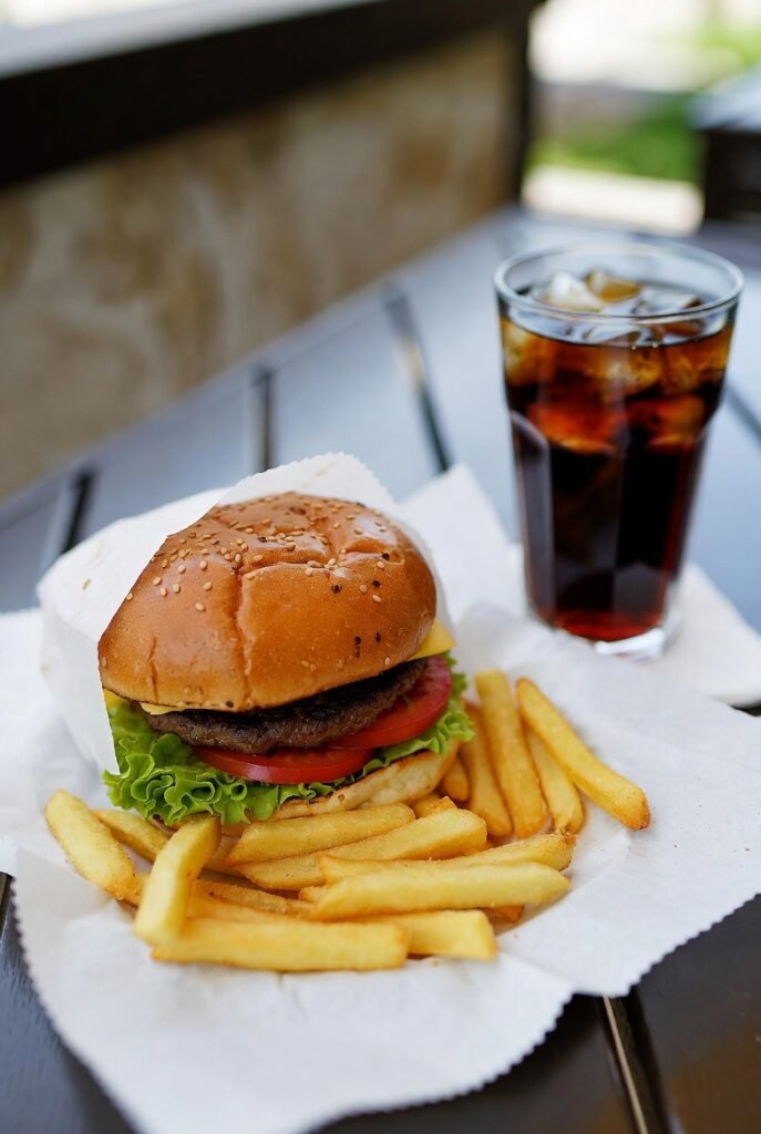 burger with fries and a coke